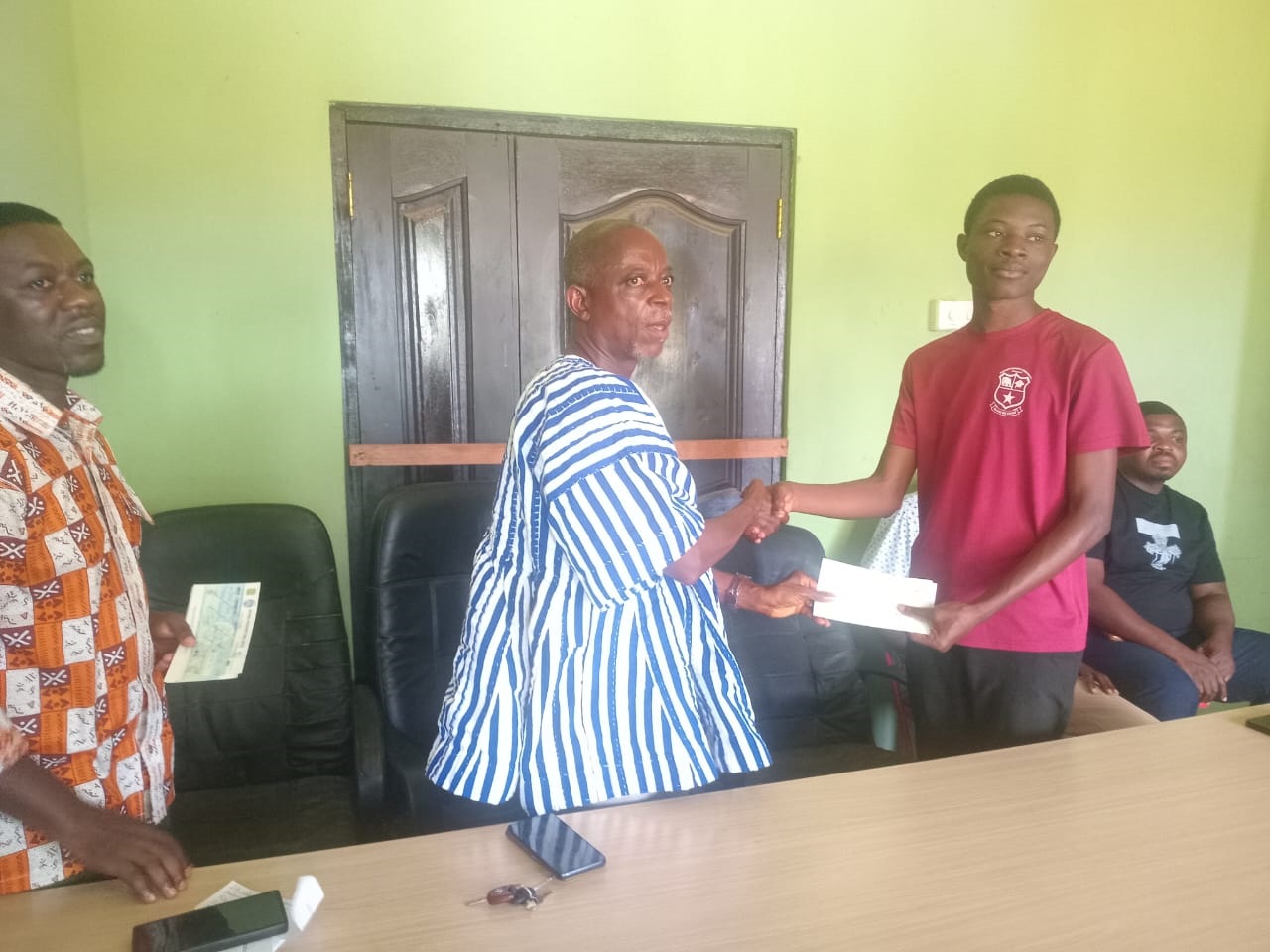 A beneficiary receiving his cheque